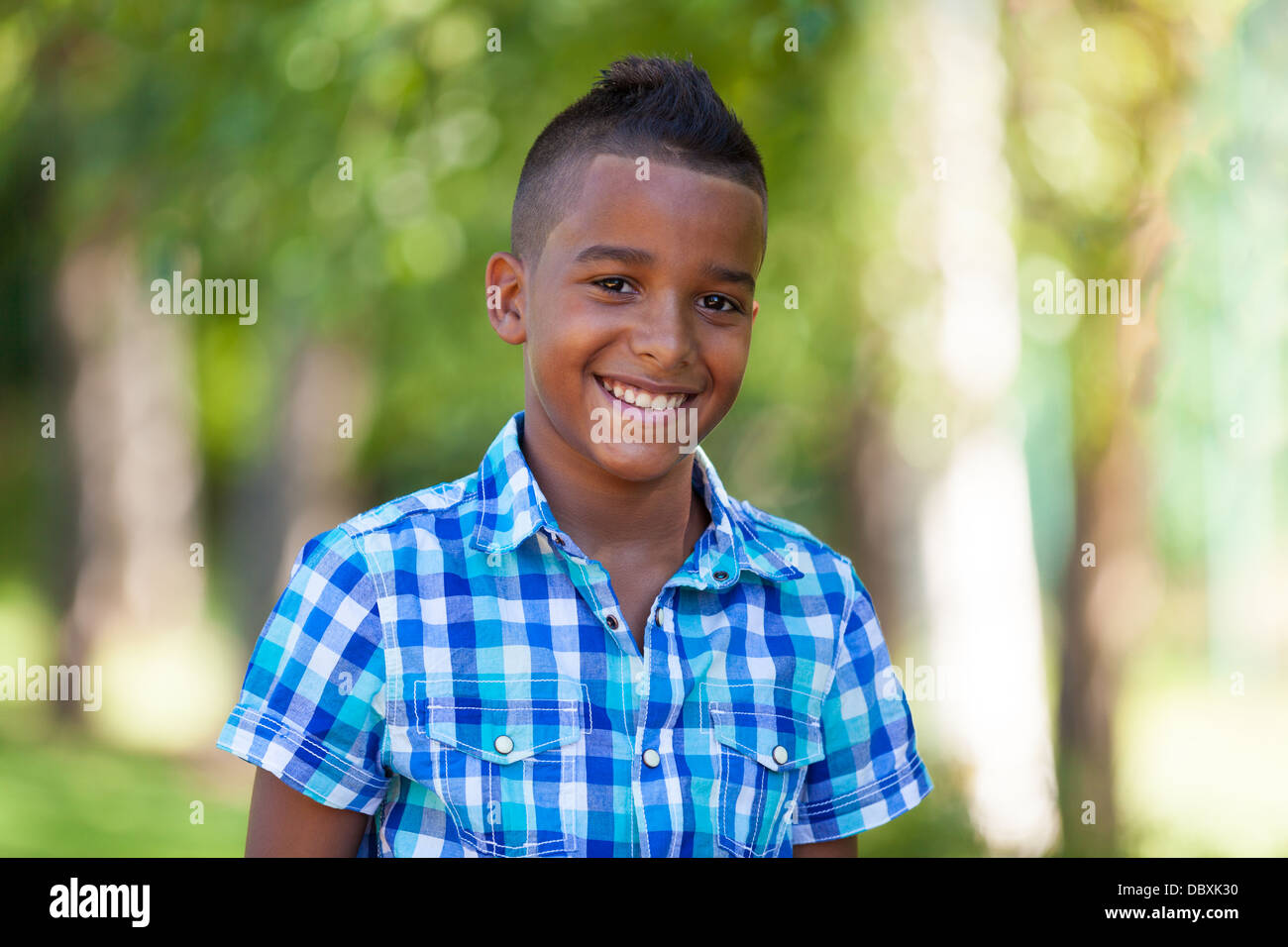 Outdoor portrait of a cute teenage black boy - African people Stock Photo