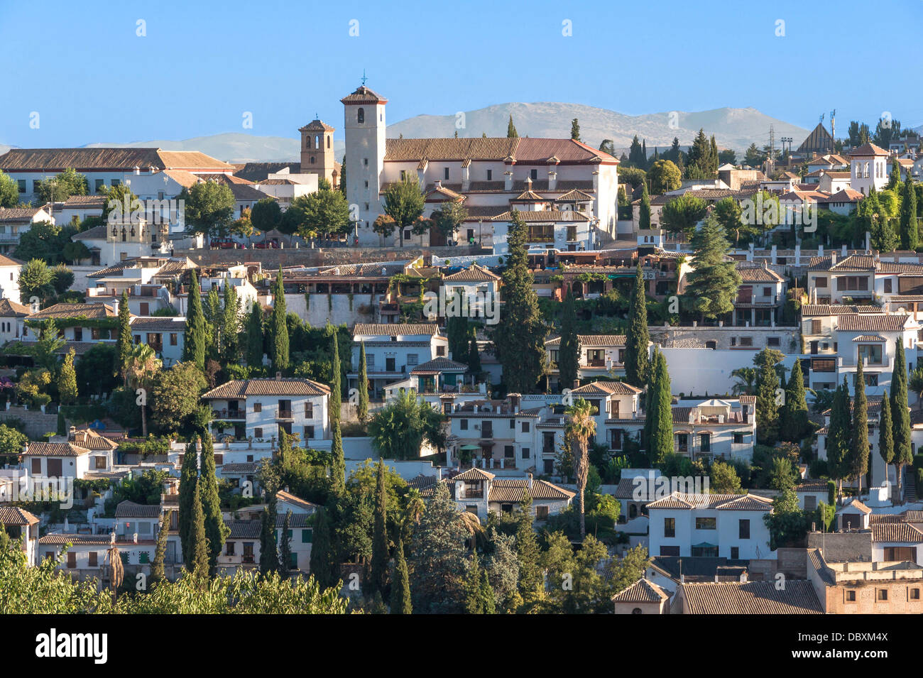 Church and mirador San Nicolas, overlooking the Albayzin neighborhood, seen from Alhambra, Granada, Spain. Stock Photo