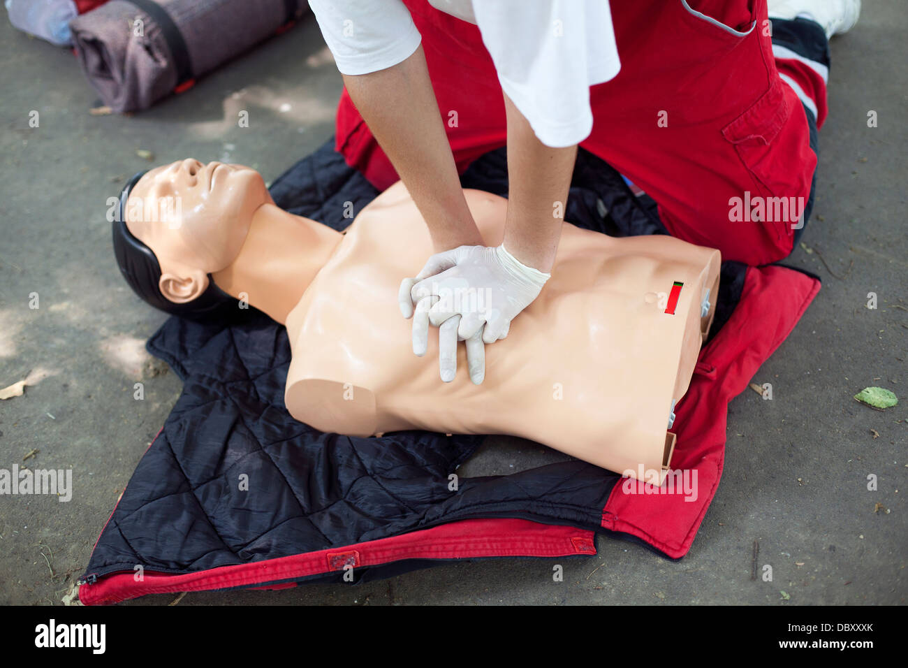 CPR training heart massage Stock Photo