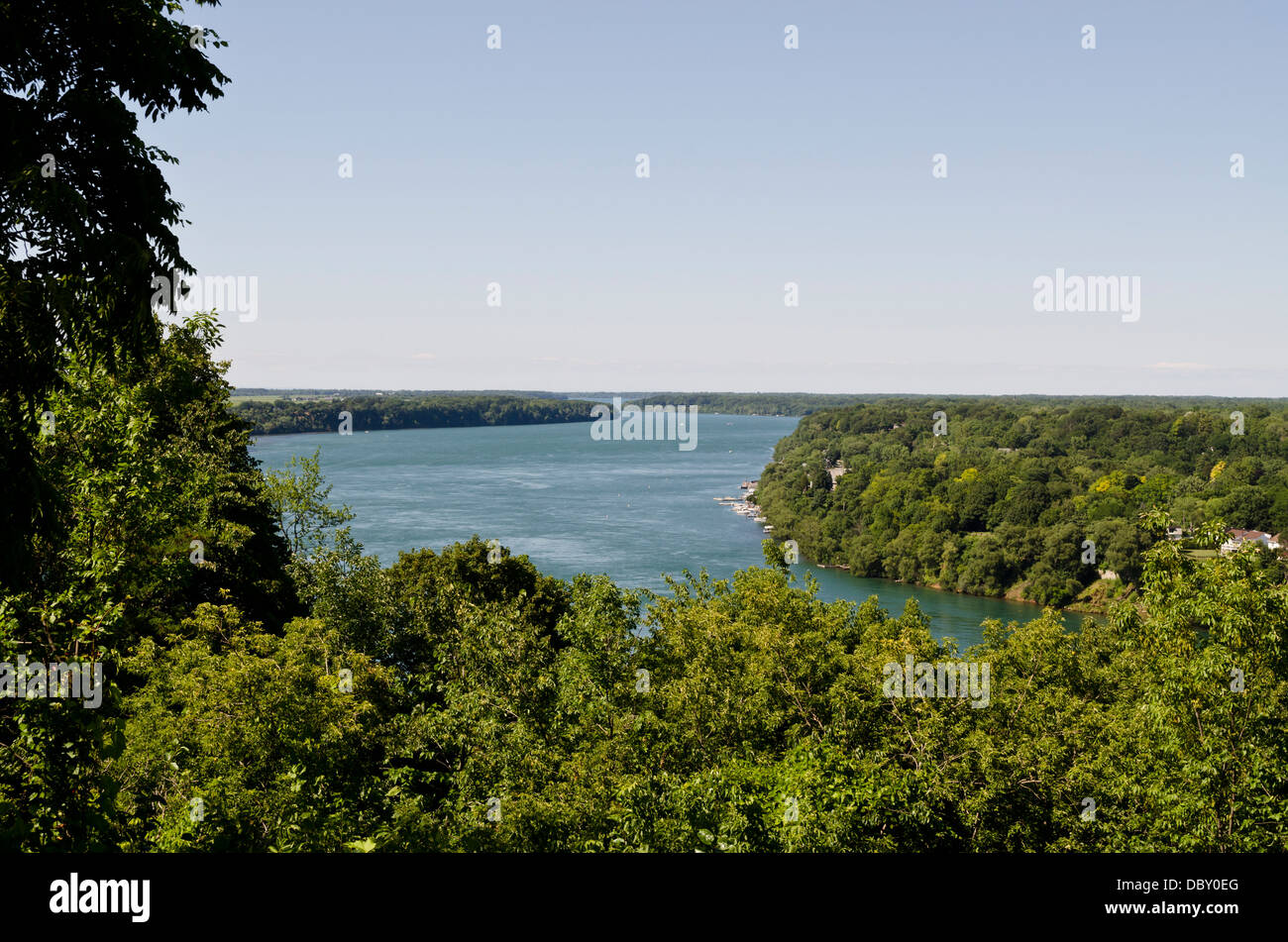 View of the Niagara river from Queenston, Ontario, Canada.   Looking over towards New York state. Lush forests and greenery. Stock Photo