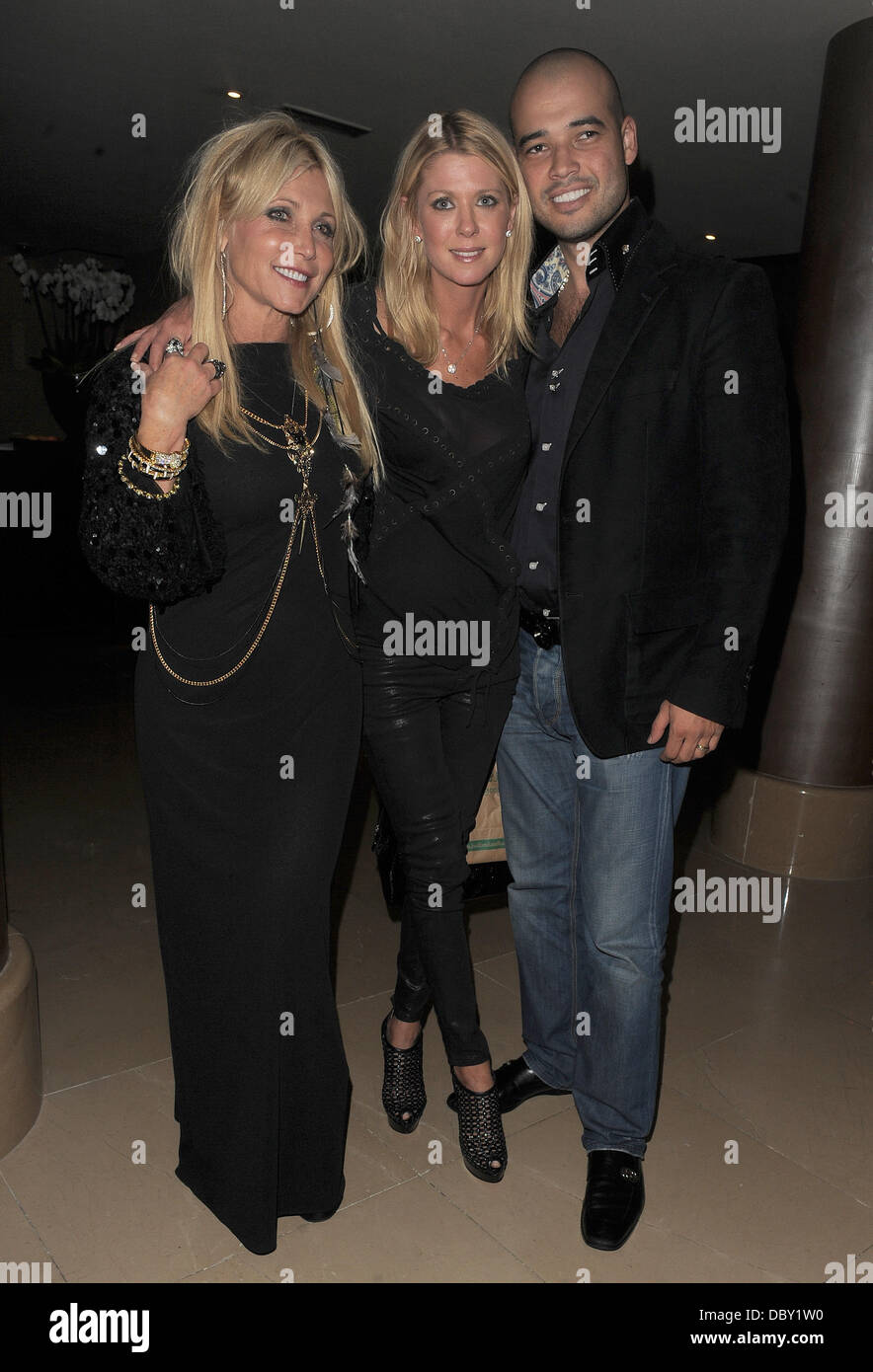 Tara Reid and her husband Zack Kehayov pose for a picture at their