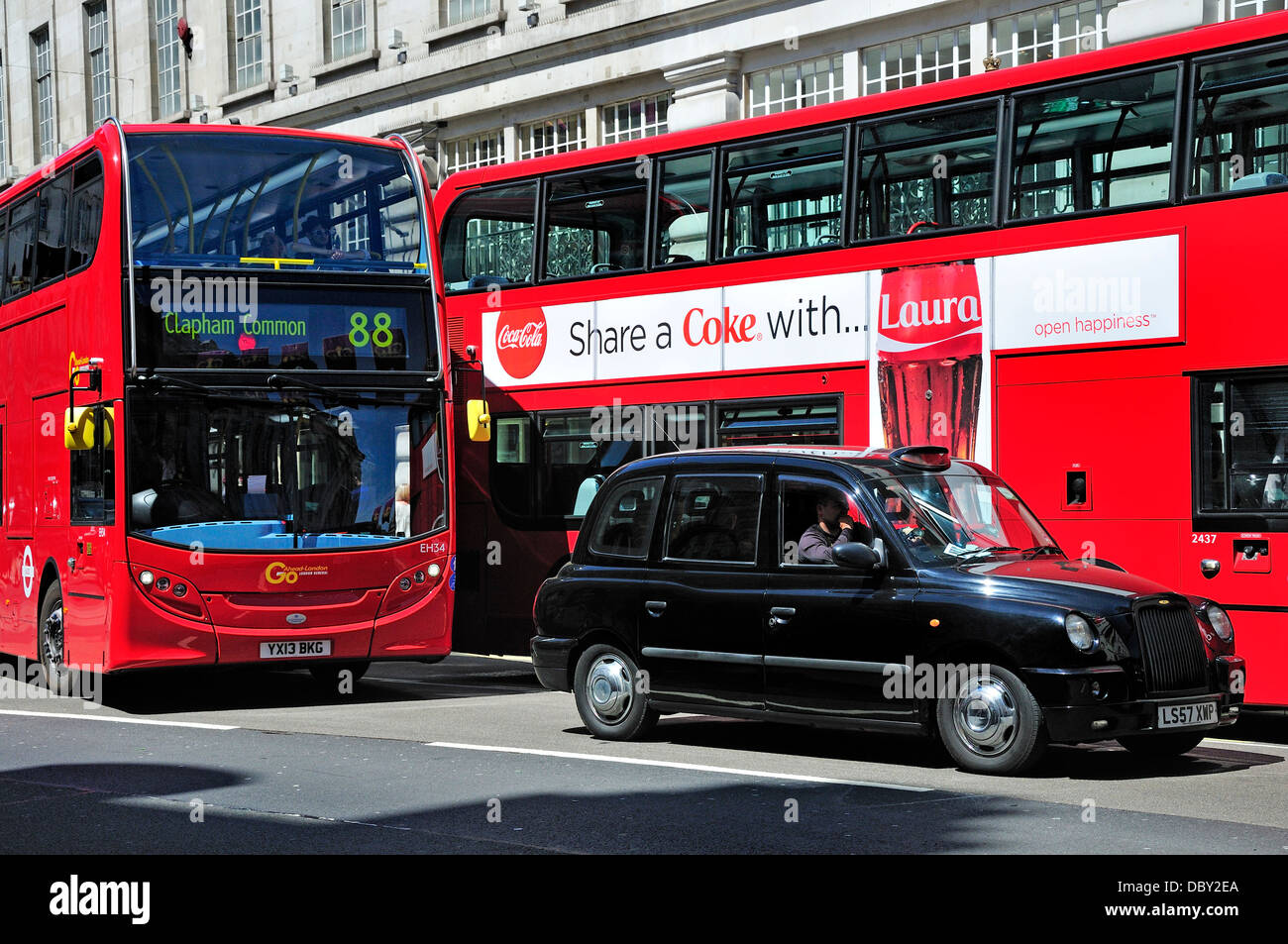 London, England, UK. Public transport - taxi and red buses Stock Photo