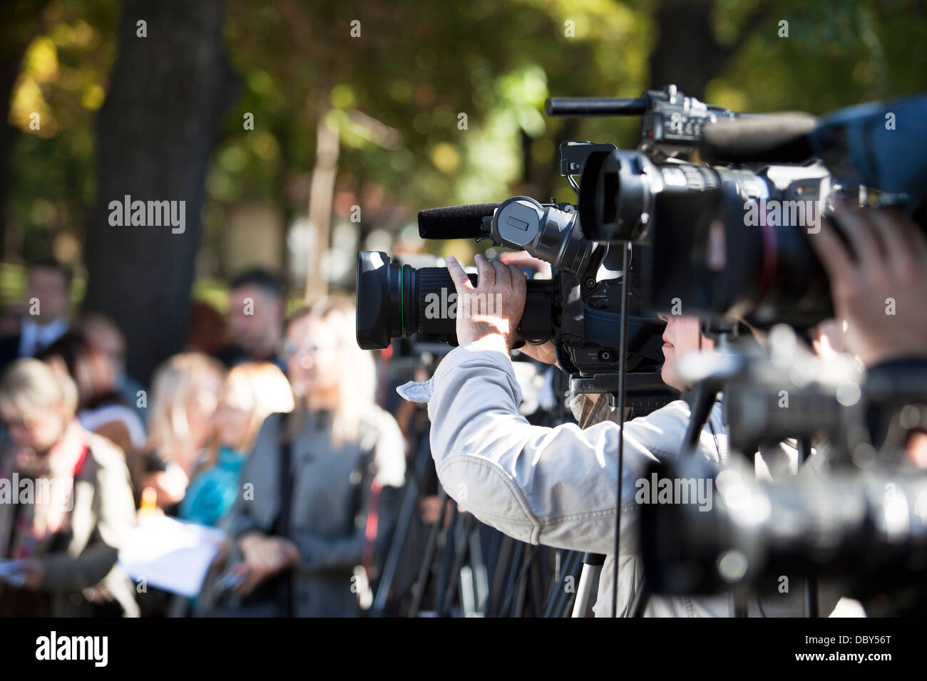 Covering an event with a video camera Stock Photo Alamy