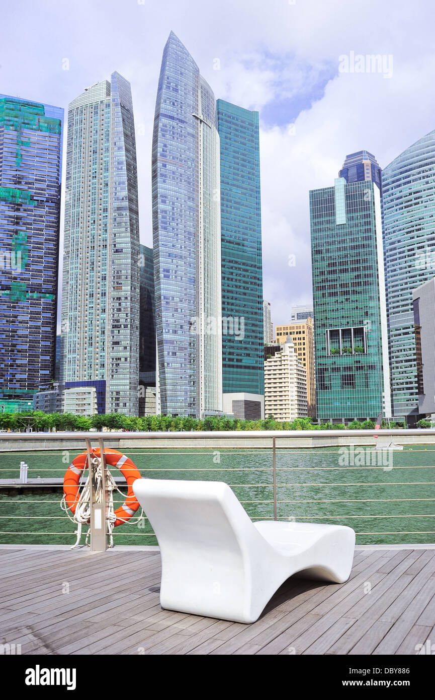 Modern bench in front of Singapore downtown Stock Photo Alamy