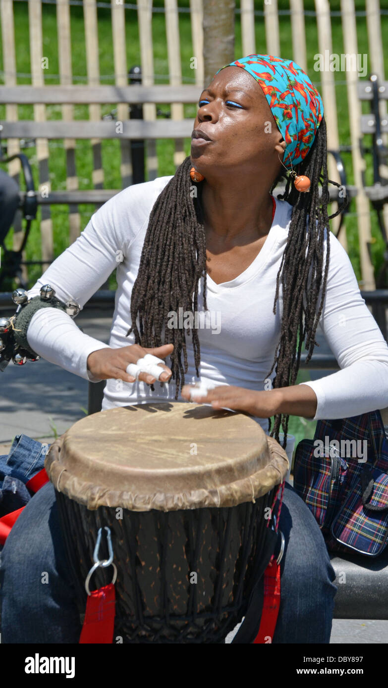 Woman conga bongo player percussionist Washington Square Park Greenwich  Village New York City Stock Photo - Alamy
