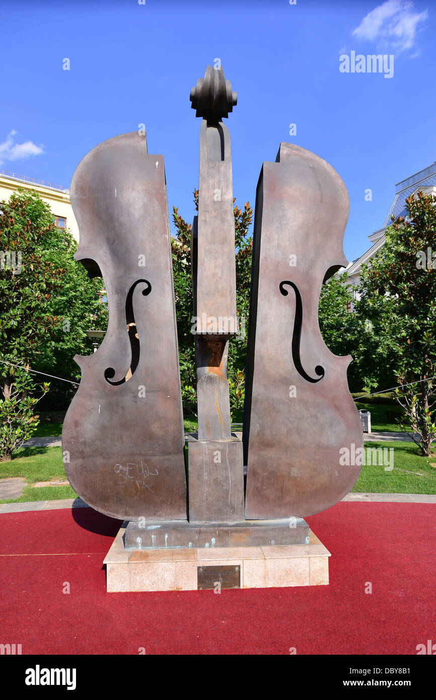 Giant violin made by artist Ioan Bolborea. This artwork is located in  University Square, Bucharest, Romania Stock Photo - Alamy