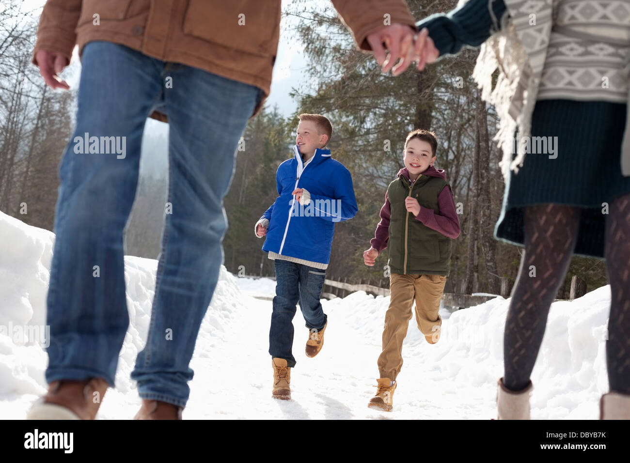 Two boys holding hands hi-res stock photography and images - Alamy