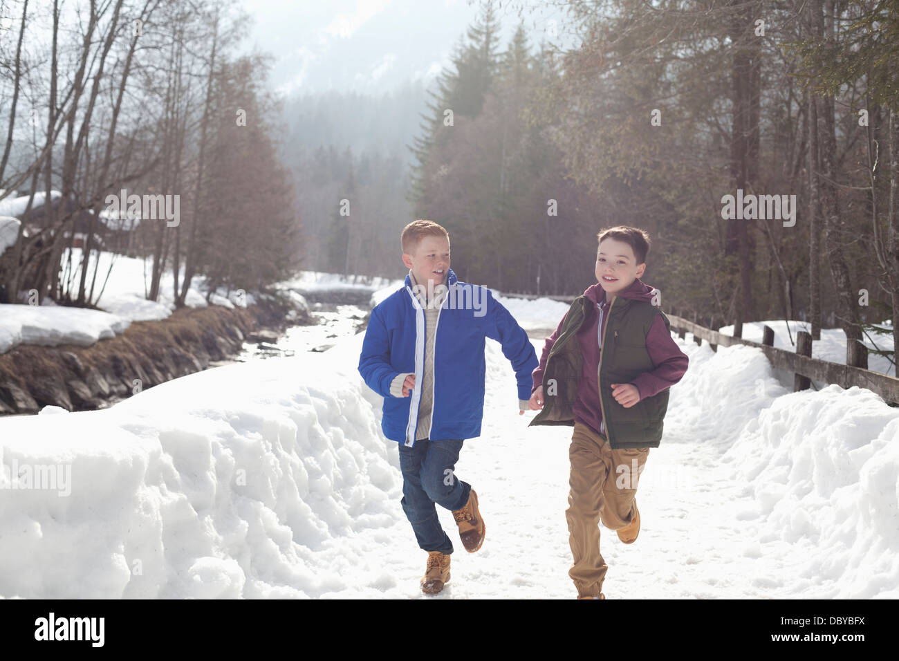 Two boys holding hands hi-res stock photography and images - Alamy