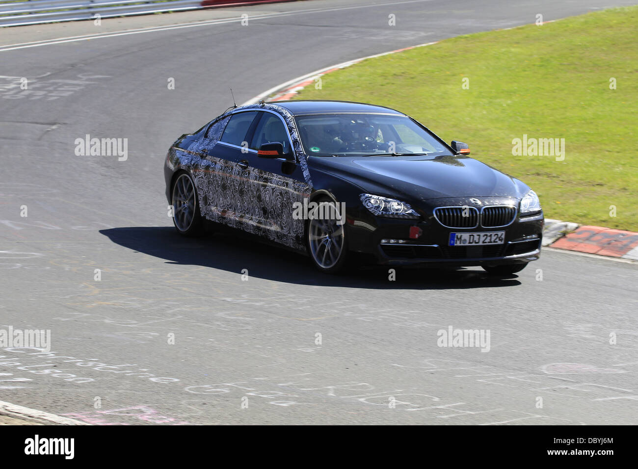 Preview 'spy shots' of the BMW 6 series GT being driven around the famous Nurburgring motorsport track in Nürburg, Germany.  Germany - 2012, Stock Photo