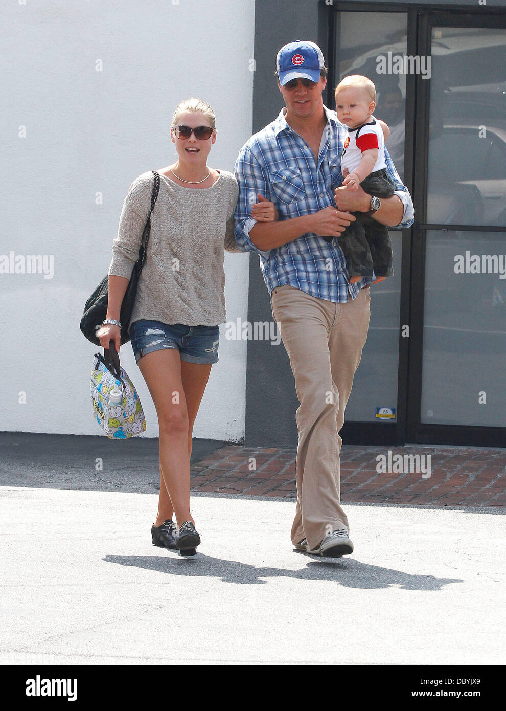 Ali Larter with husband Hayes MacArthur and their son Theodore leaving