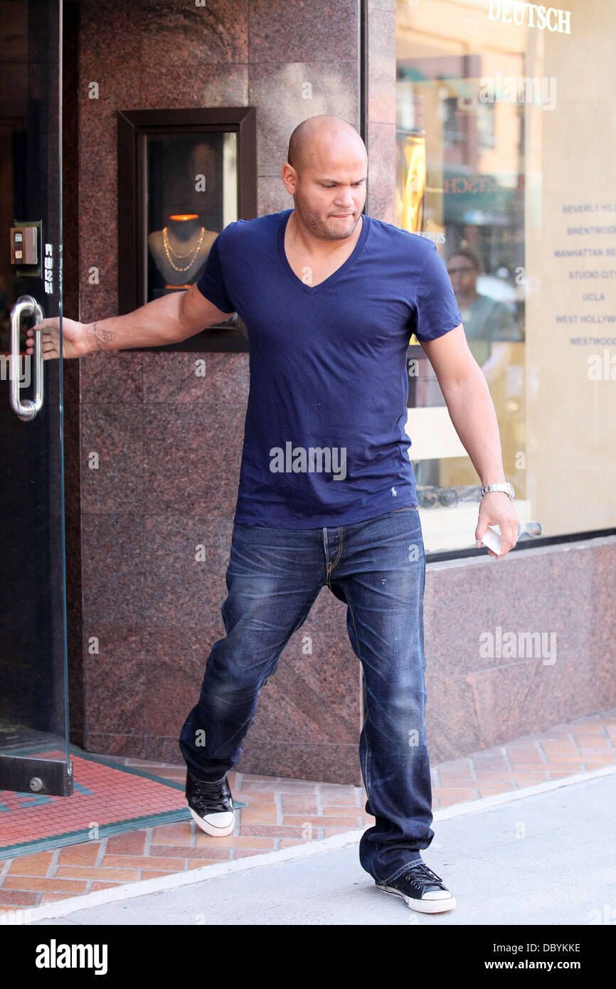 New father, Stephen Belafonte buys a new wristwatch for himself at ...