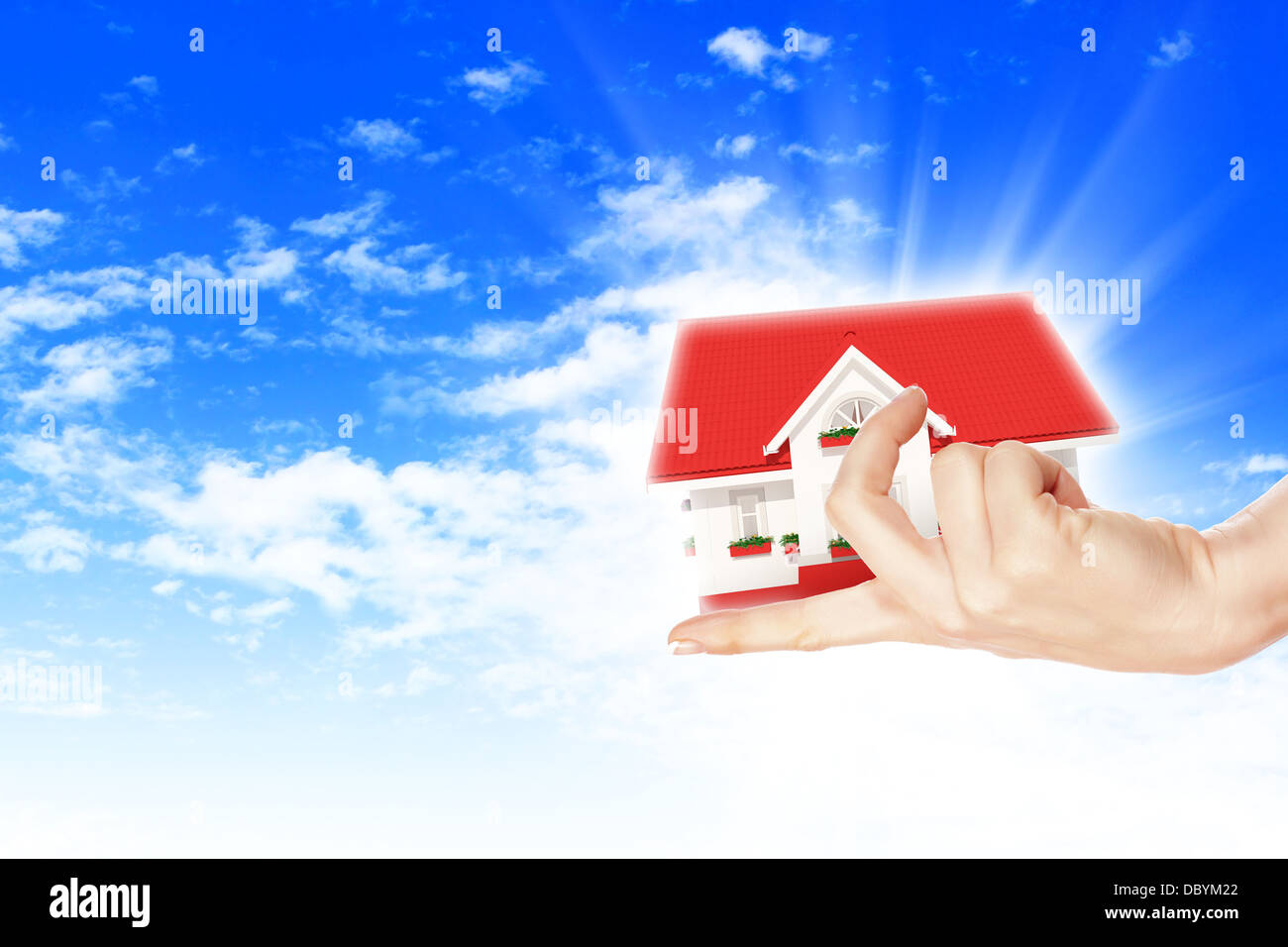the house in hands on blue sky Stock Photo - Alamy
