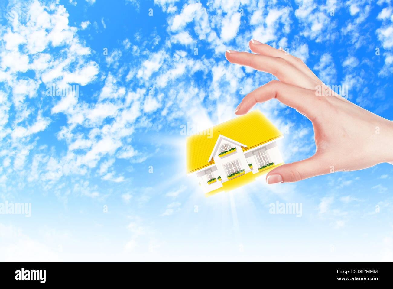 the house in hands on blue sky Stock Photo - Alamy