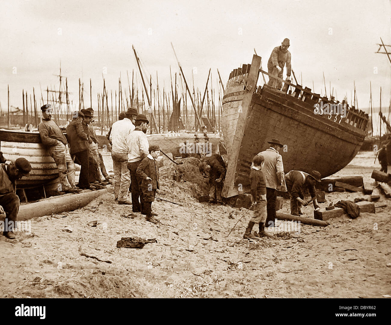 St. Ives fishing boat beached for repairs Victorian period Stock Photo