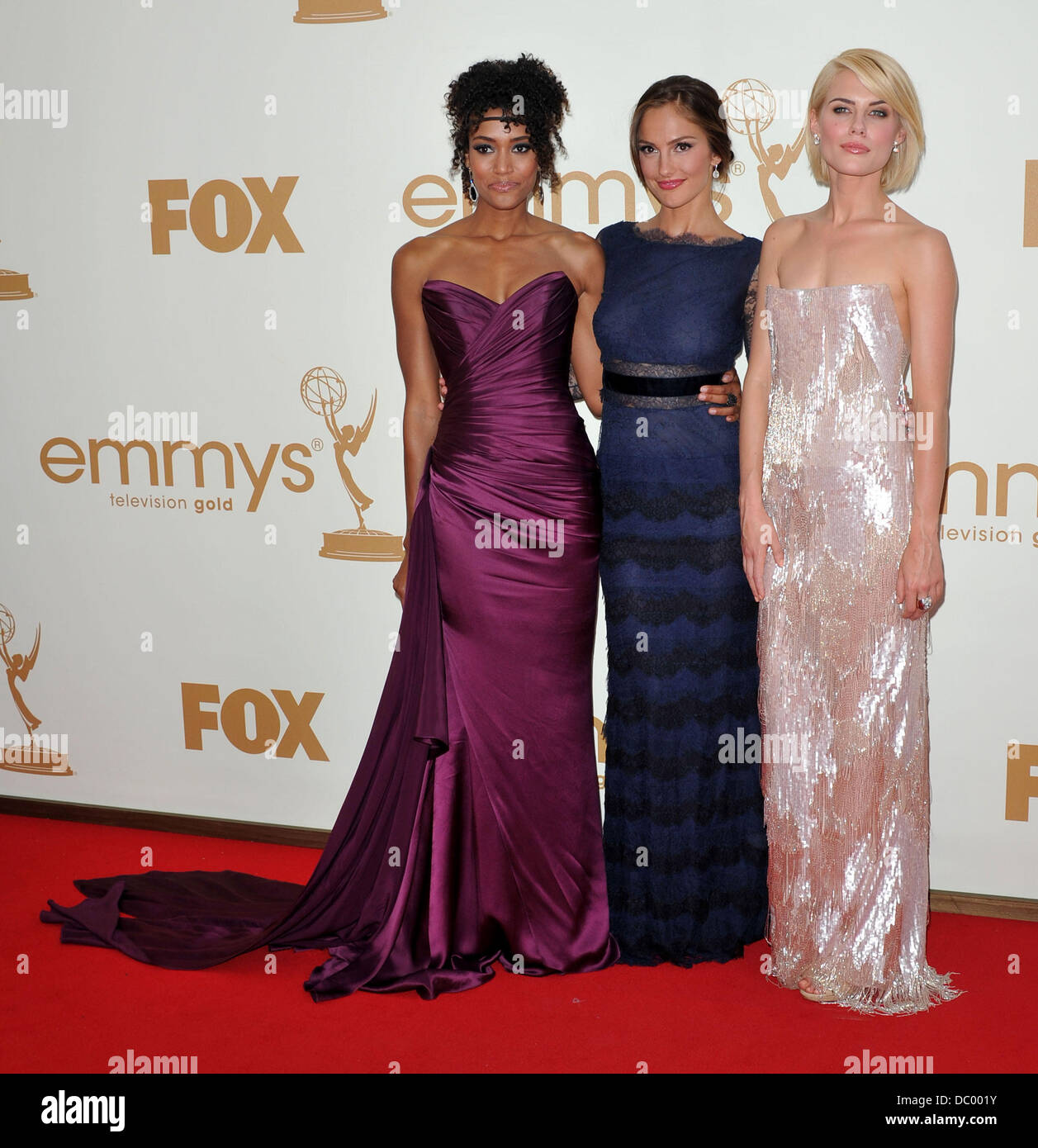 Minka Kelly, Rachael Taylor and Annie Ilonzeh The 63rd Primetime Emmy Awards, held at Nokia Theatre L.A. LIVE - Arrivals. Los Angeles, California - 18.09.11 Stock Photo