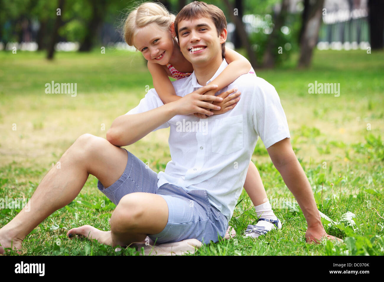 Father and daughter in the park Stock Photo - Alamy