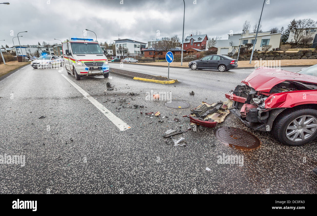 Car accident and ambulance. Crash in Kopavogur, suburb of Reykjavik, Iceland Stock Photo