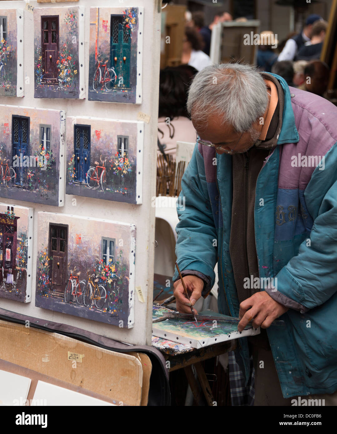 Artist painting in Montmartre's famous Place du Tertre, Paris Stock Photo