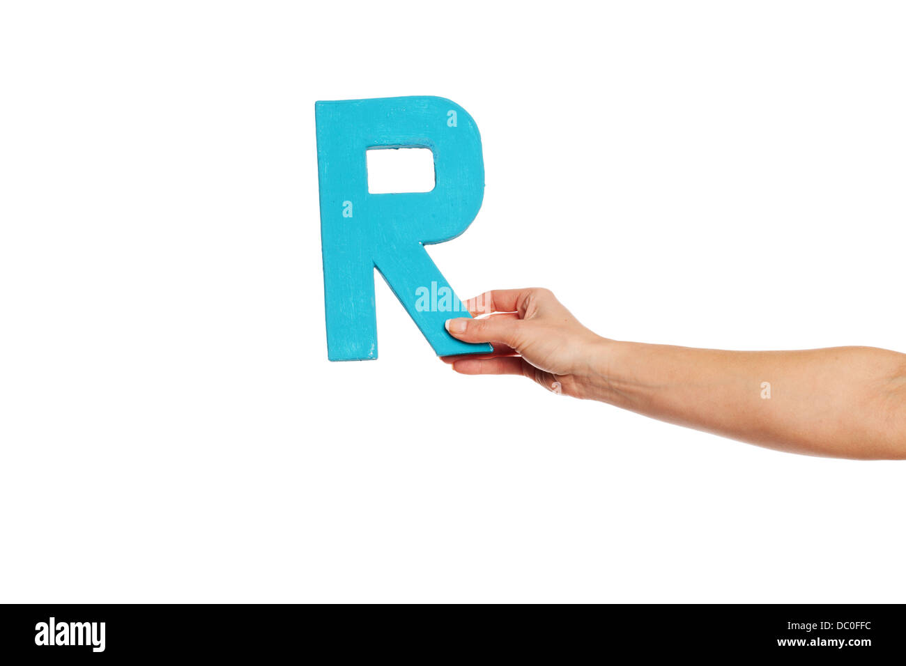 hand holding up the letter R from the right Stock Photo - Alamy