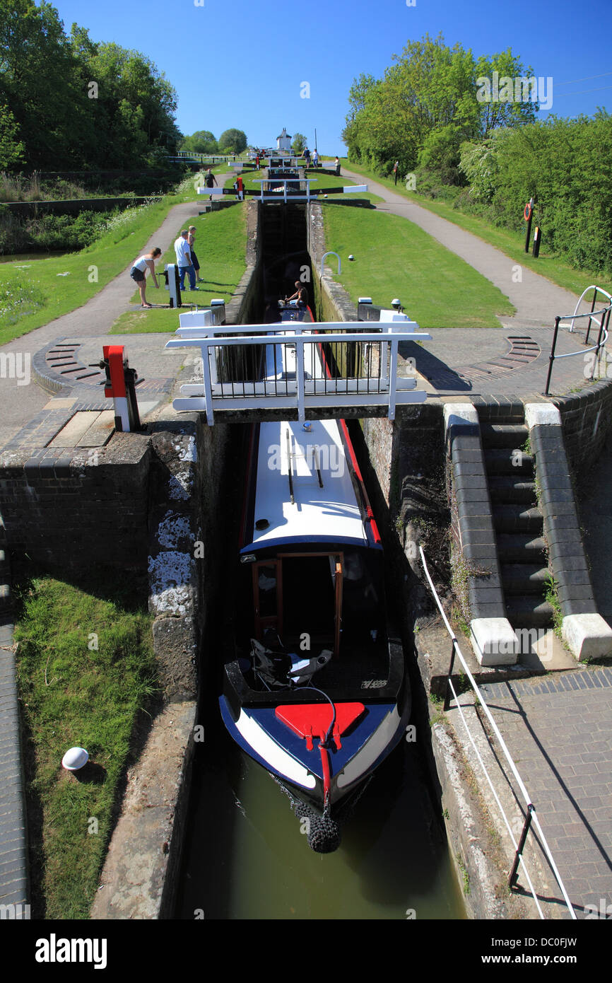 A narrowboat descending Foxton Locks, on the Grand Union Canal, the largest flight of staircase canal locks in England Stock Photo