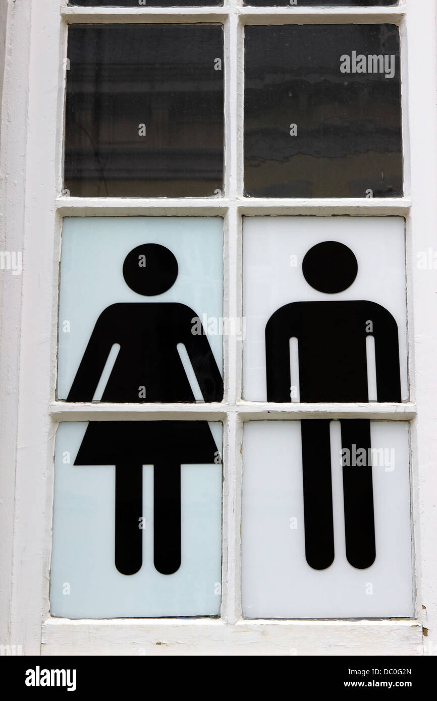 Bruges Belgium Flanders Europe Brugge Belgian male female toilet sign in black and white in window Stock Photo