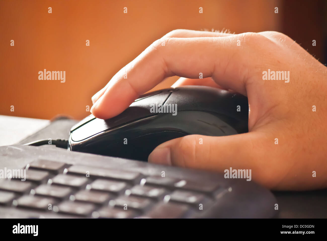 Control mouse by hand Stock Photo Alamy