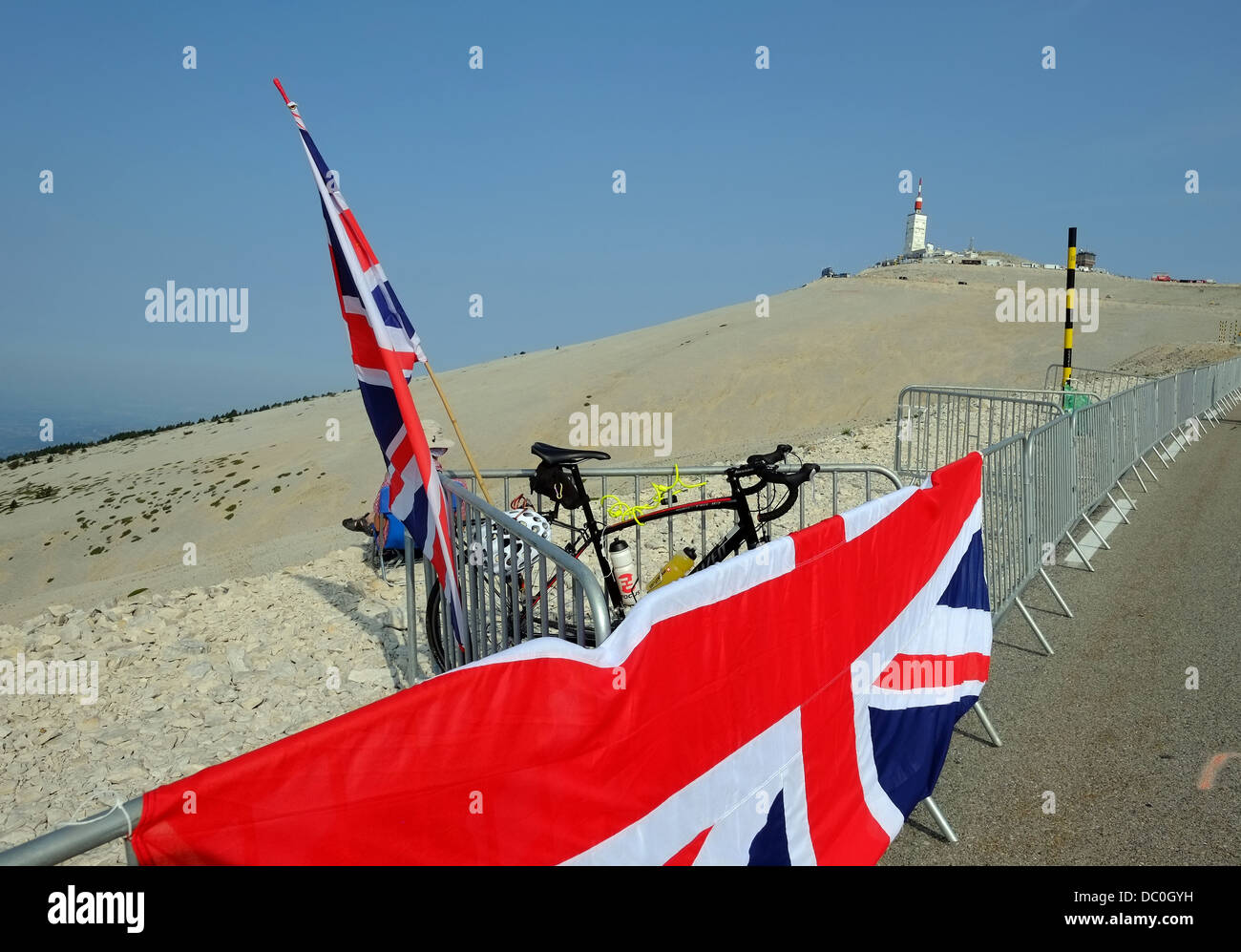 Union Jack flag and spectator 1Km from the summit on Stage 15 of the 2013 Tour De France Givors – Mont Ventoux Stock Photo