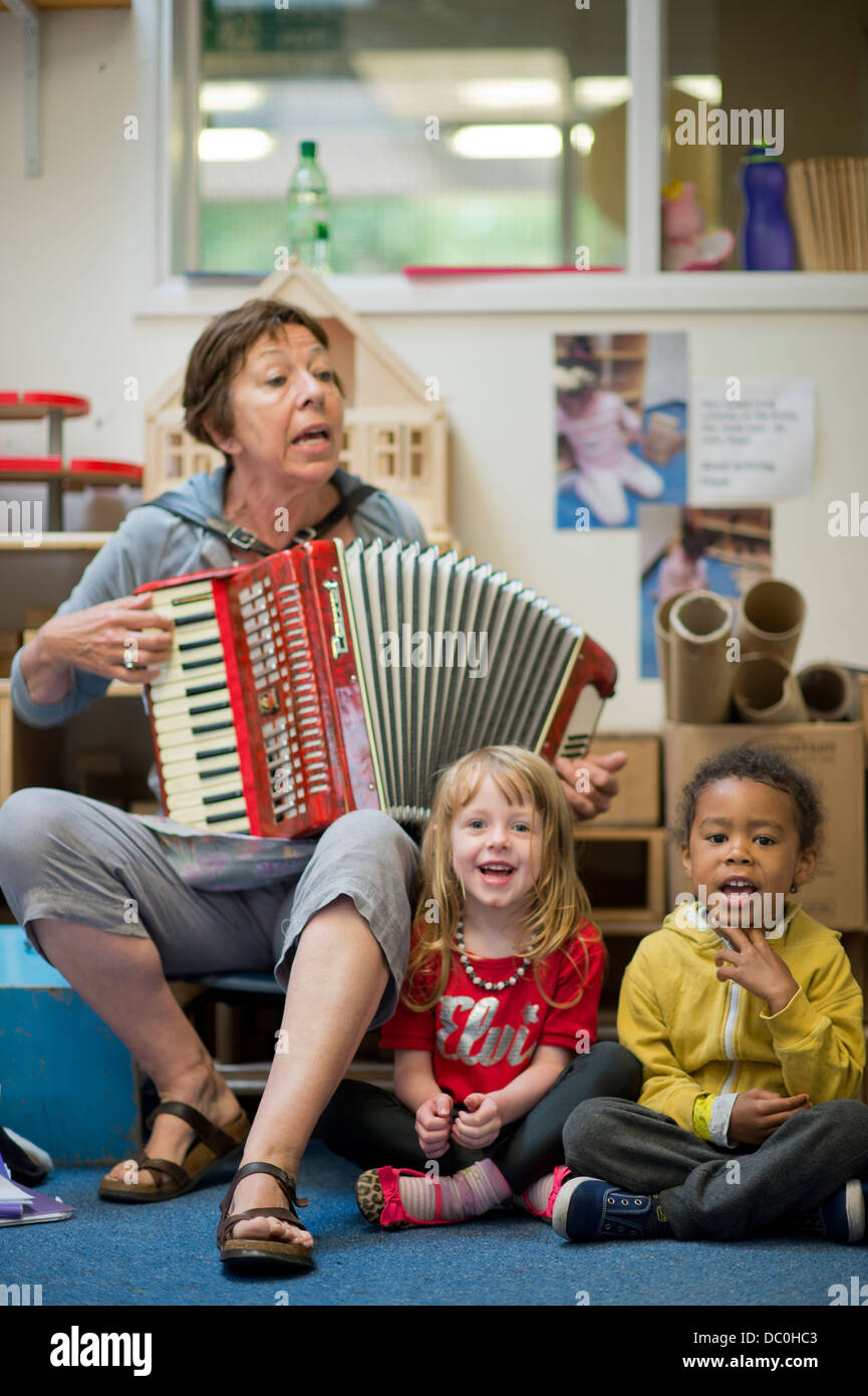 St. Pauls Nursery School and Children's Centre, Bristol UK 2013 - A music class. Stock Photo