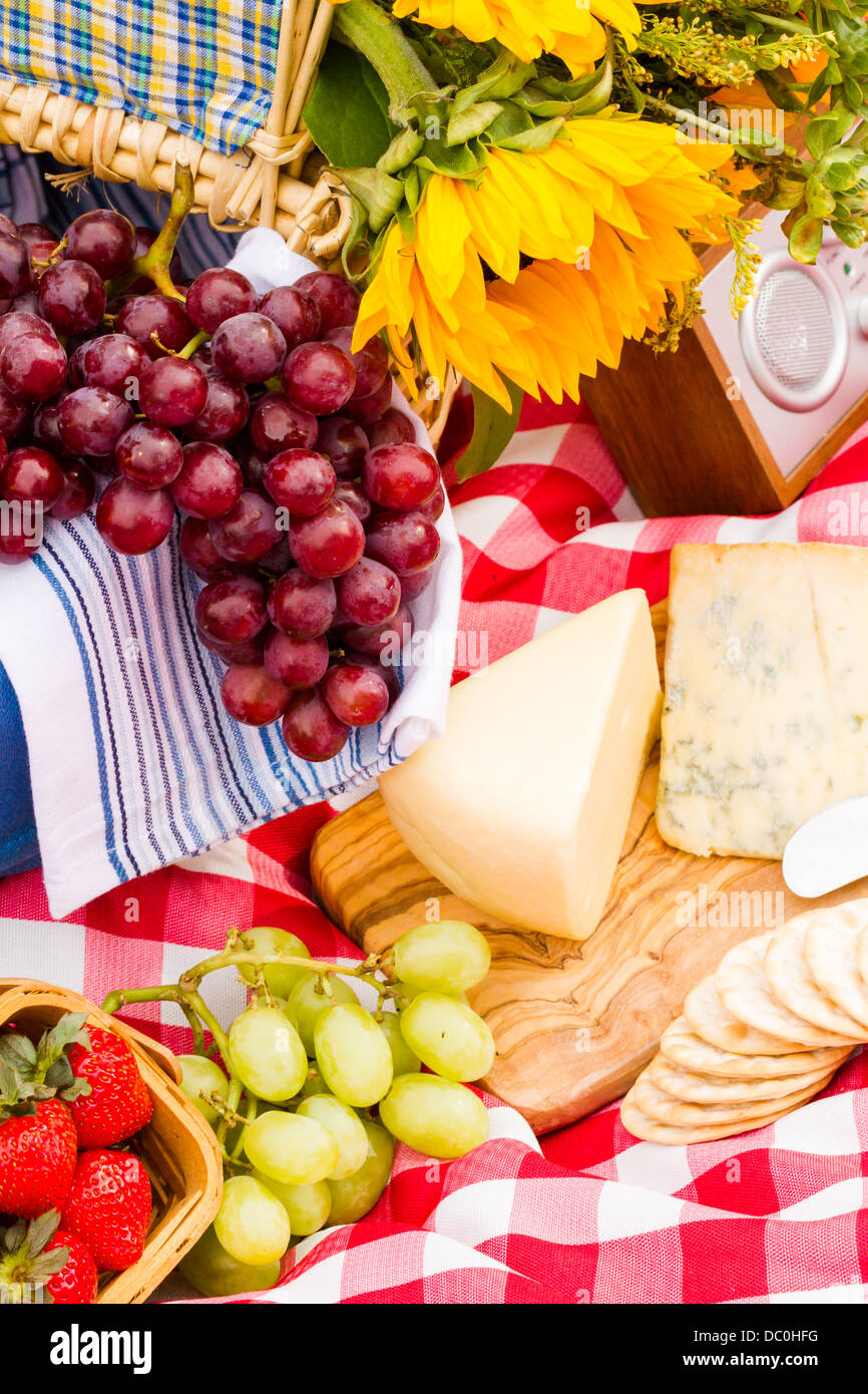 Summer picnic with a basket of food in the park Stock Photo Alamy