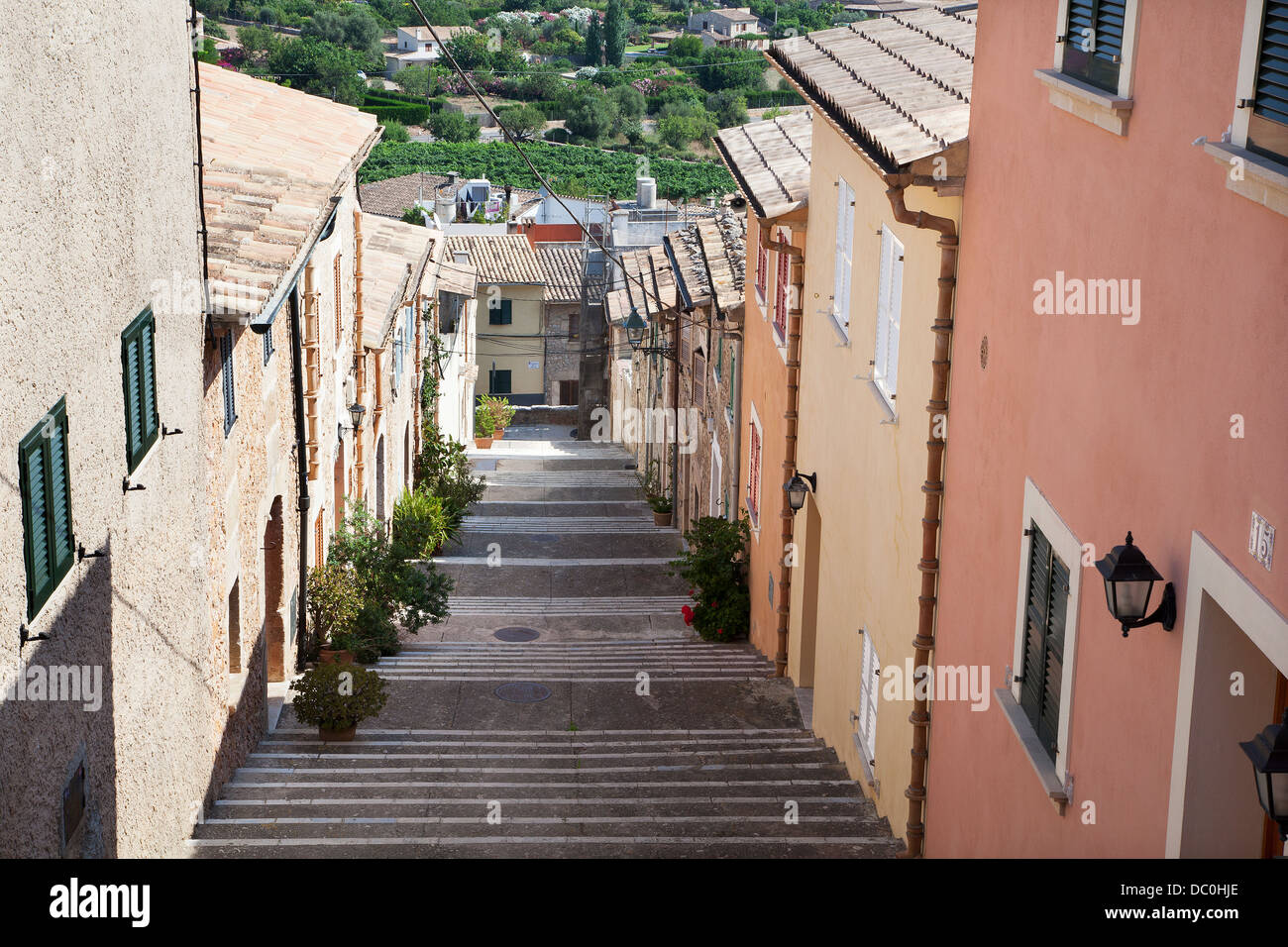Terraced houses on stepped street  in Pollensa Old Town Stock Photo