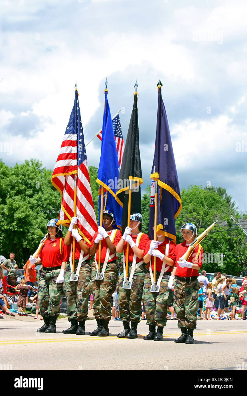 Young Women from the Fort McCoy National Guard Challenge Academy, hold Flags at a parade in West Salem, WI United States Stock Photo