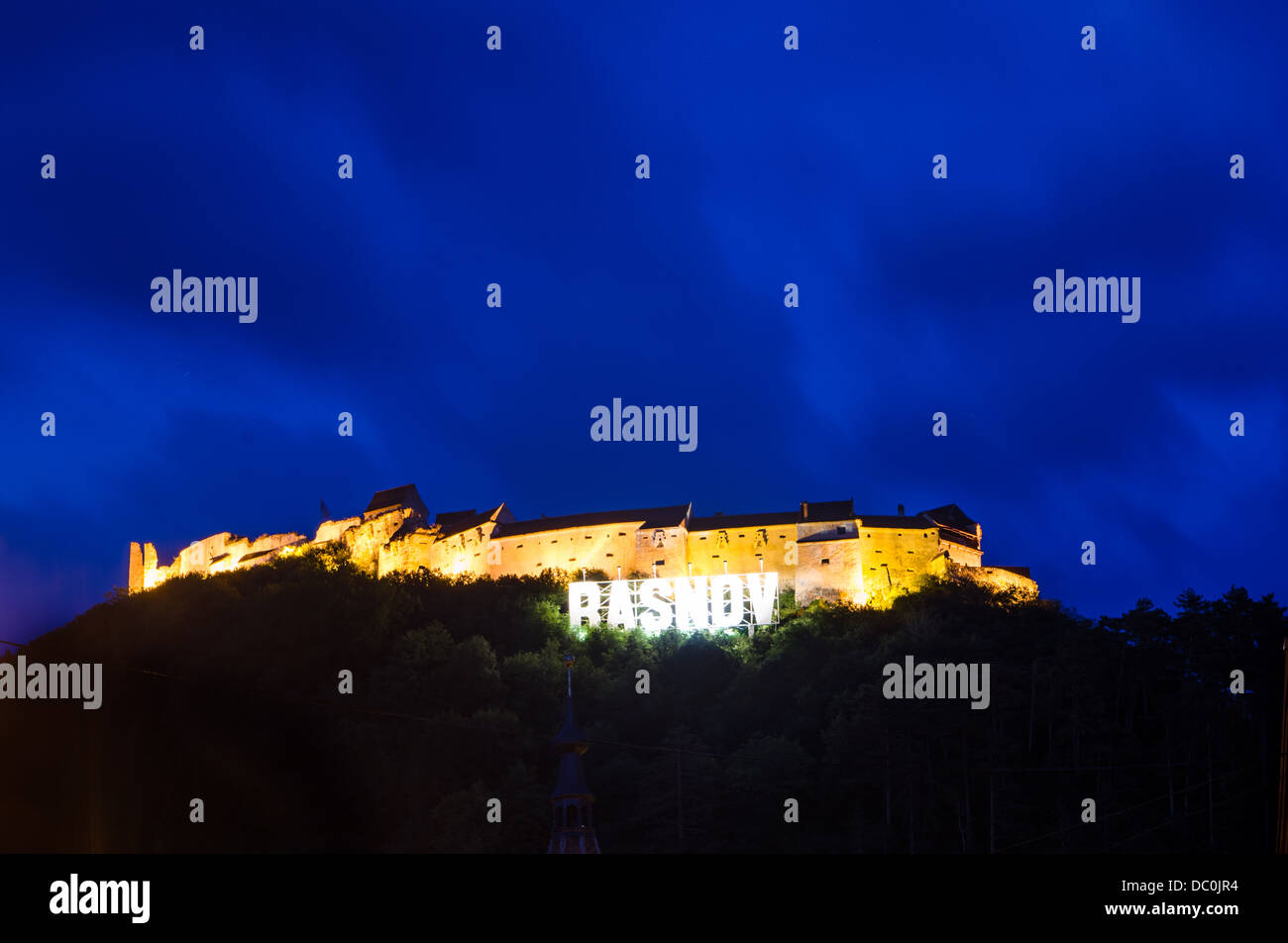 Night-view of the medieval fortress of Rasnov, Transylvania Stock Photo