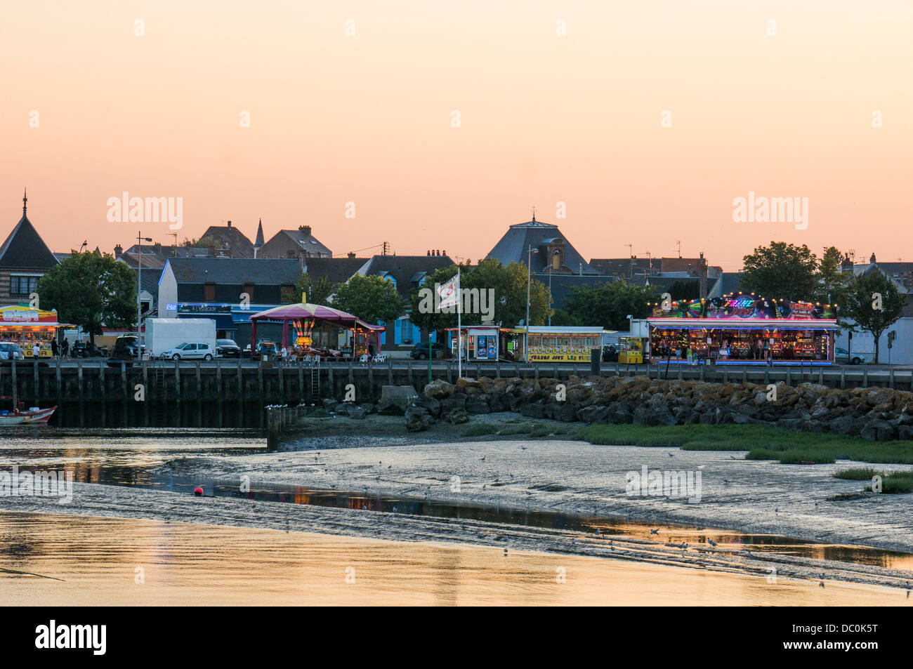 A view at dusk of the amusement arcades at in the coastal town of Le Crotoy, in the Somme department in Picardie, northern France, Europe. Stock Photo