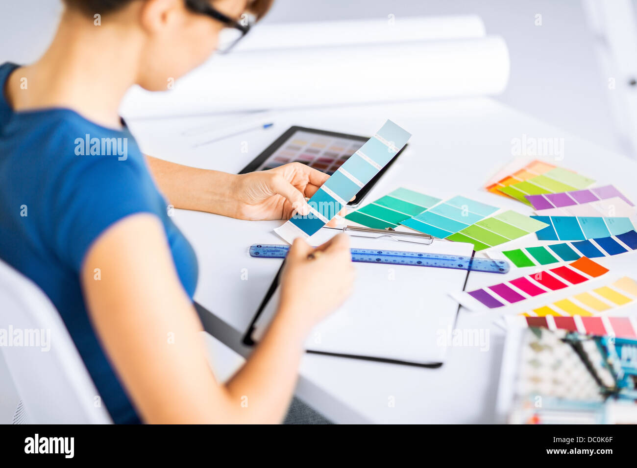 Working With Color woman working with color samples for selection Stock Photo - Alamy