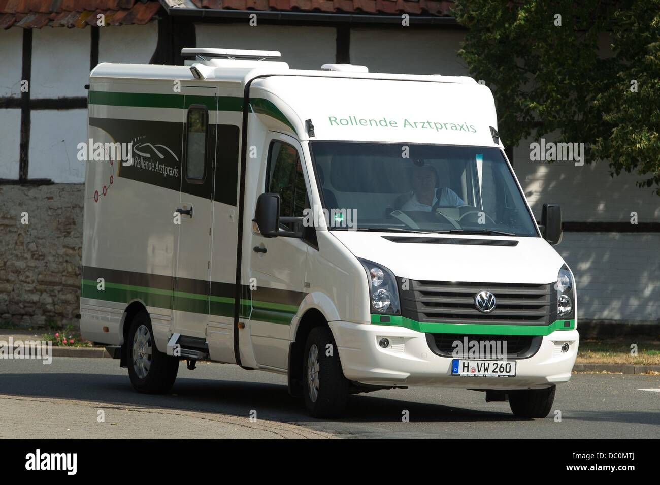 Germany's first medical practice on wheels drives through Winnigstedt, Germany, 06 August 2013. Because of the shortage of doctors in rural areas, two doctors will now cover six municipalities. Photo: SEBASTIAN KAHNERT Stock Photo