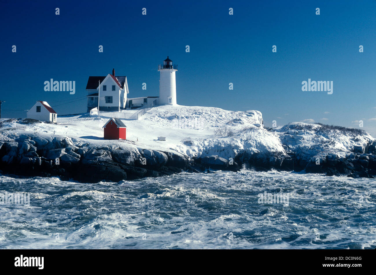 NUBBLE KIGHTHOUSE IN WINTER MAINE Stock Photo