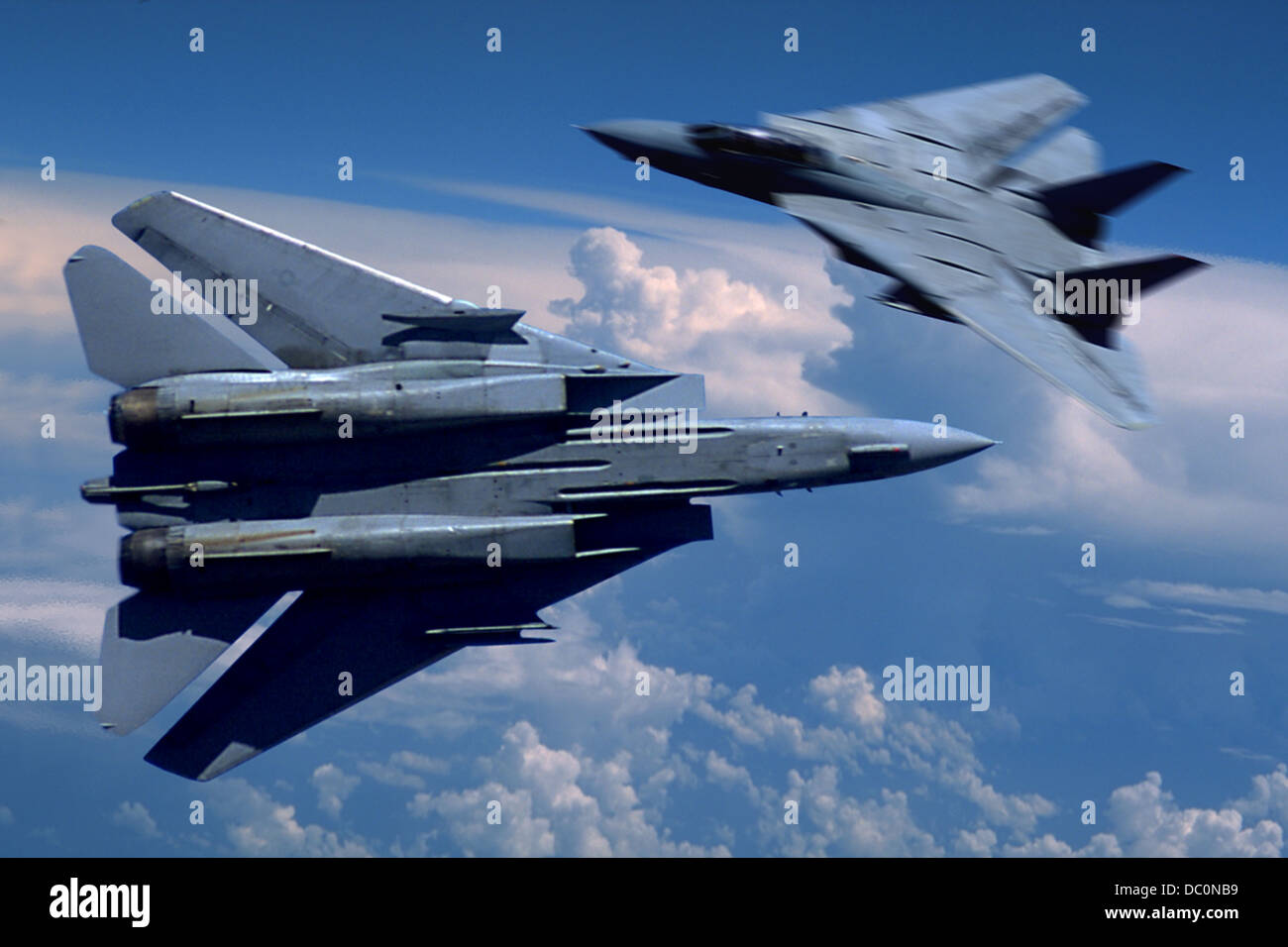 TWO USN F-14 TOMCATS FLYING OVER CLOUDS Stock Photo