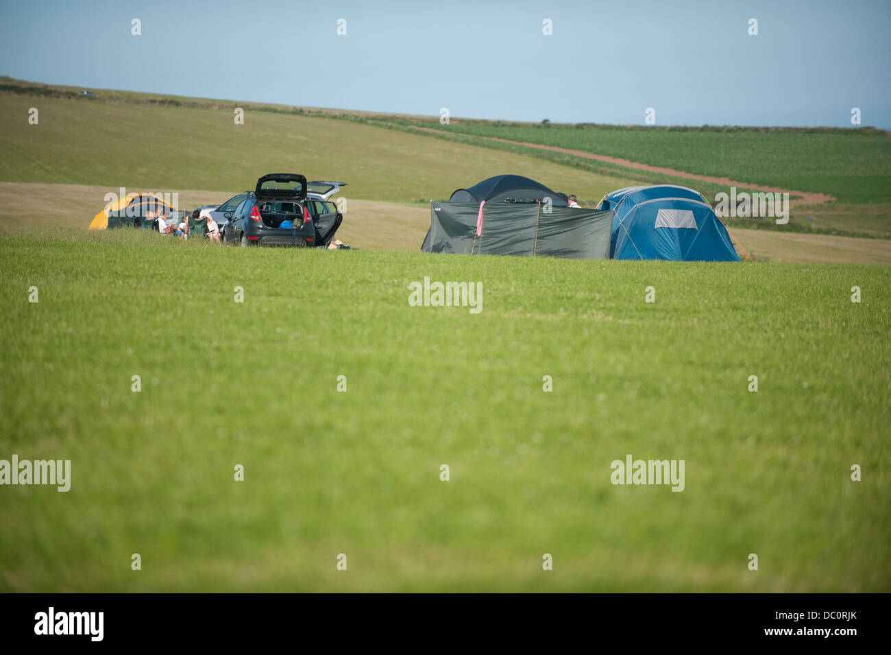 Setting up camp in the beautiful Pembrokeshire countryside Stock Photo