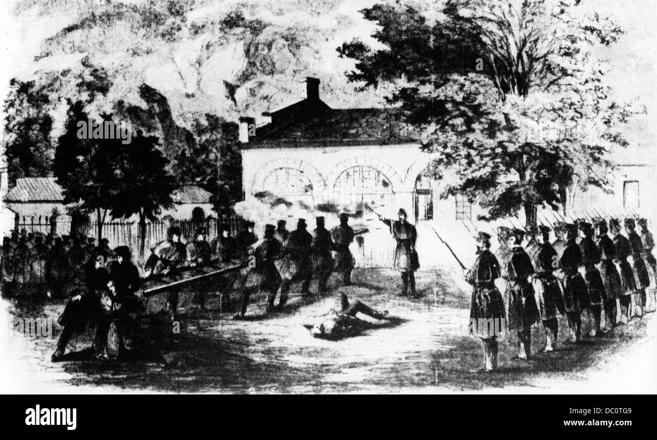 1800s 1850s OCTOBER 1859 COLONEL ROBERT E. LEE'S MARINES BREAKING INTO ENGINE HOUSE HARPER'S FERRY WV CAPTURING JOHN BROWN Stock Photo