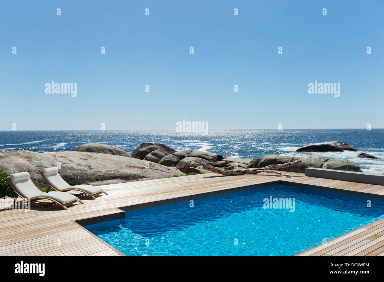 Swimming pool with ocean view Stock Photo