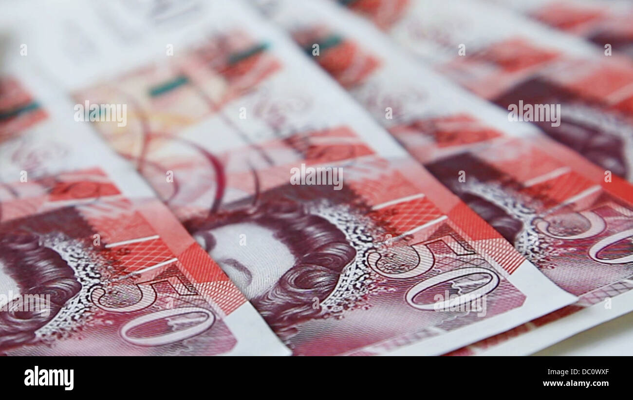 £50 notes fanned out. British currency. Stock Photo