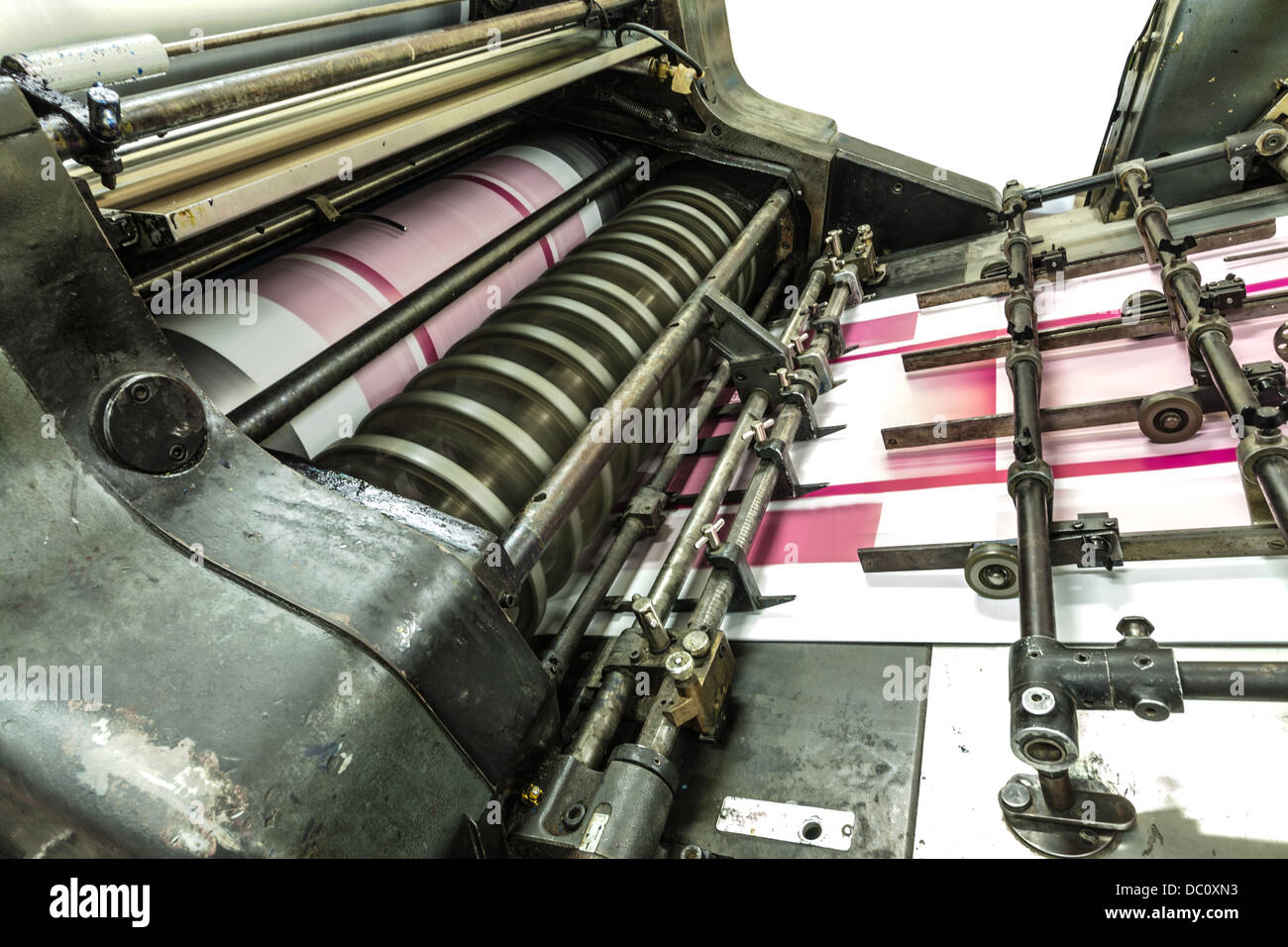 View of a part of a machine in a paper industry. It shows part of machine in work process. Stock Photo