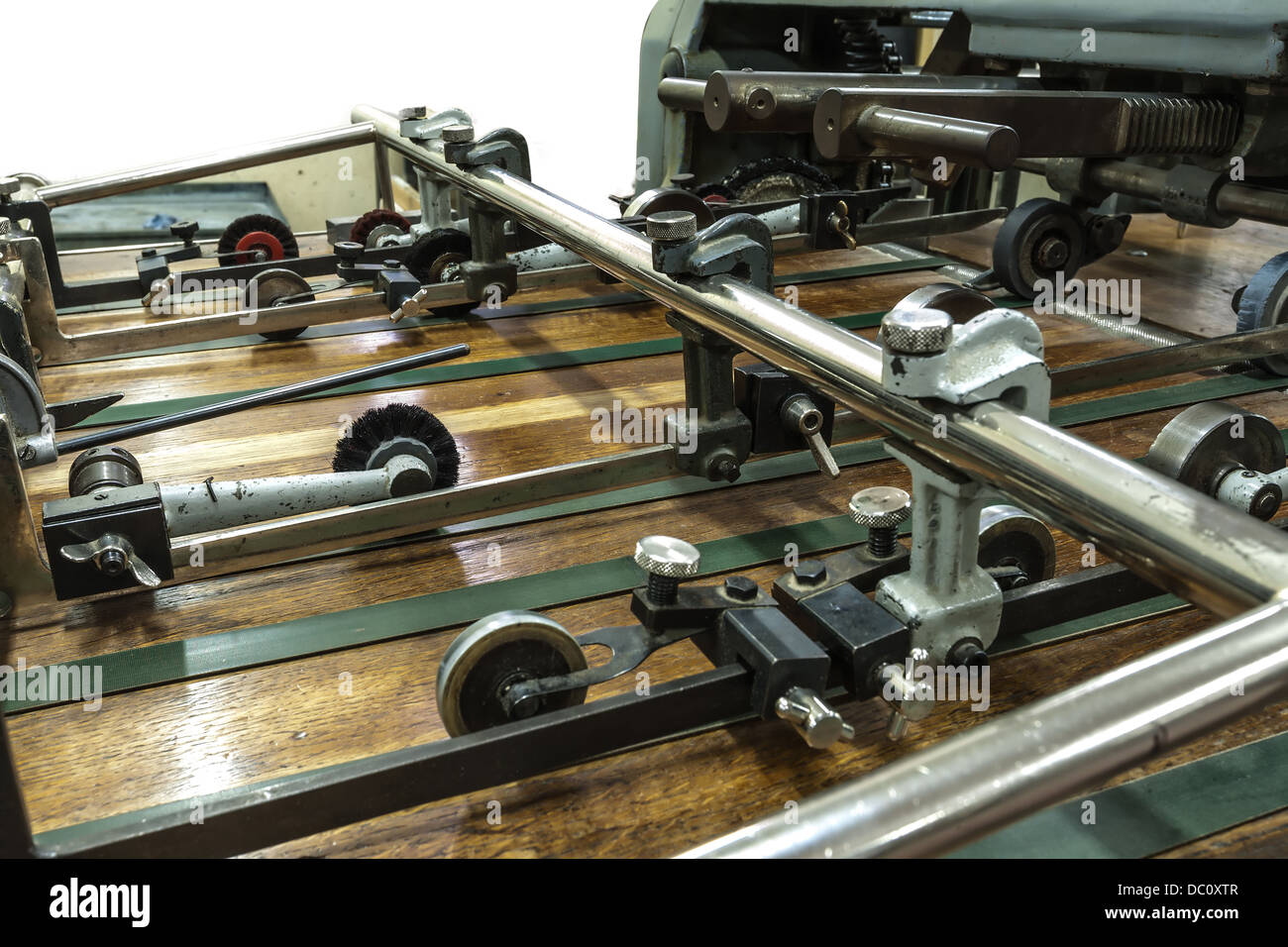 View of a part of a machine in a paper industry. It shows part of machine in work process. Stock Photo