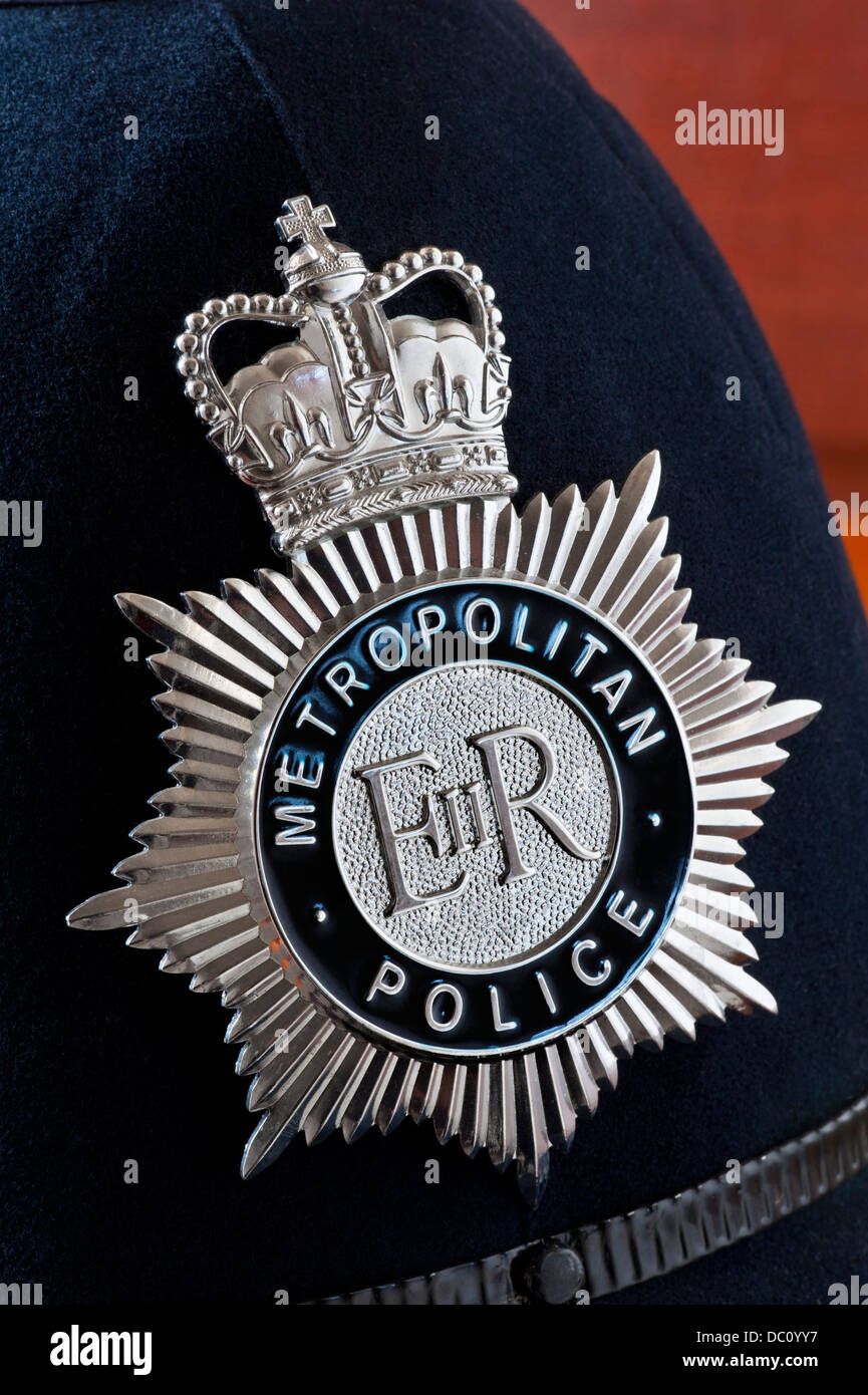Close view on Metropolitan Police helmet badge interior situation Stock Photo