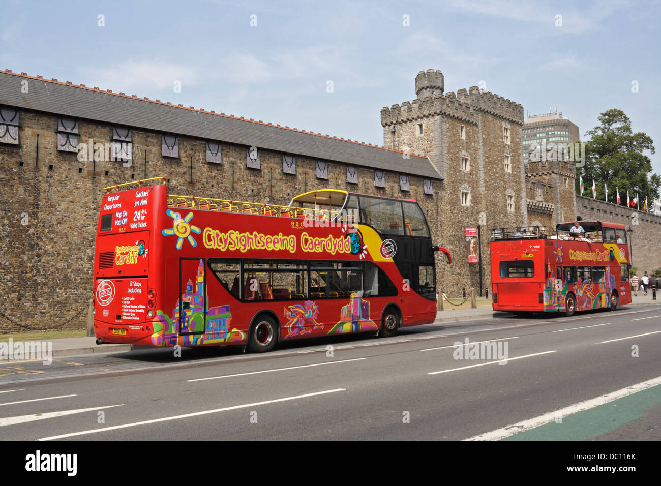 Open top sightseeing buses outside Cardiff castle / city centre Wales Stock  Photo - Alamy