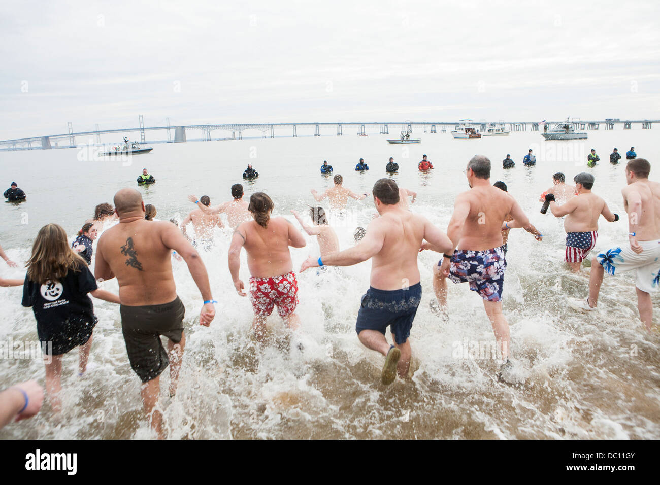 A polar bear plunge event where participants jump into ice cold water
