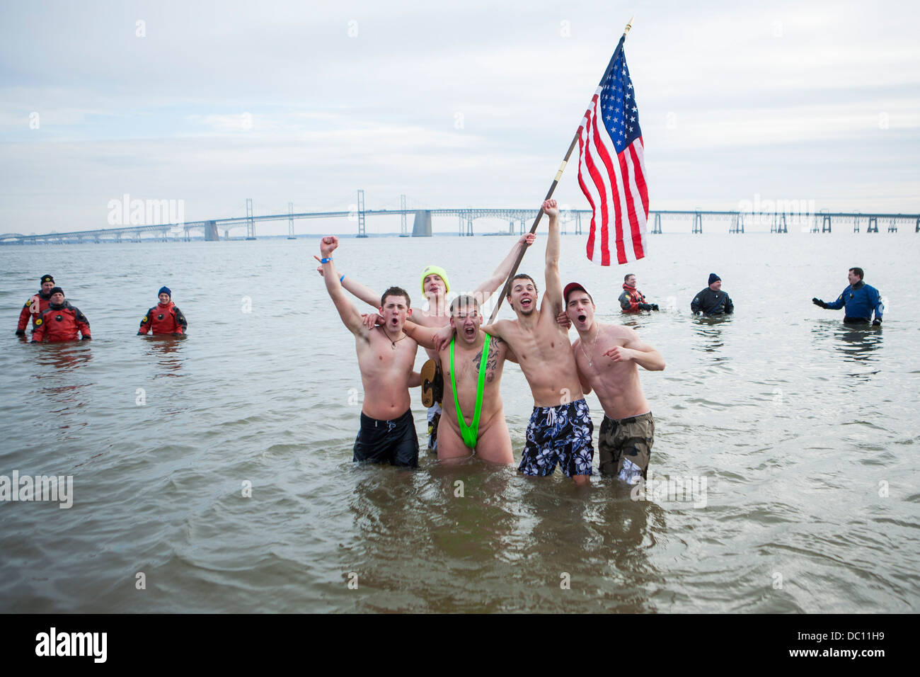 A polar bear plunge event where participants jump into ice cold water
