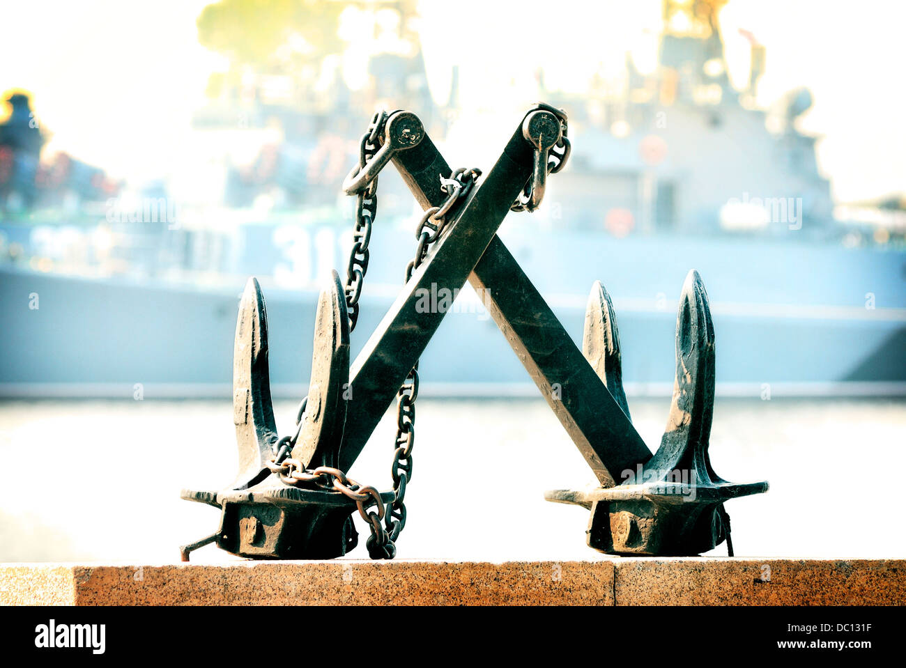 Two anchors on the background of a ship of war Stock Photo
