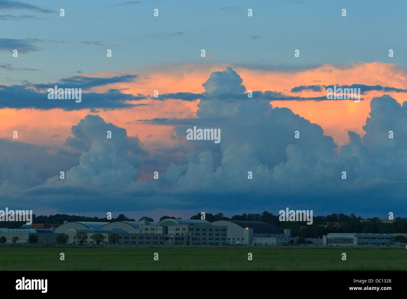 Storm clouds at sunset over the Air Force Museum in Dayton, Ohio. Stock Photo