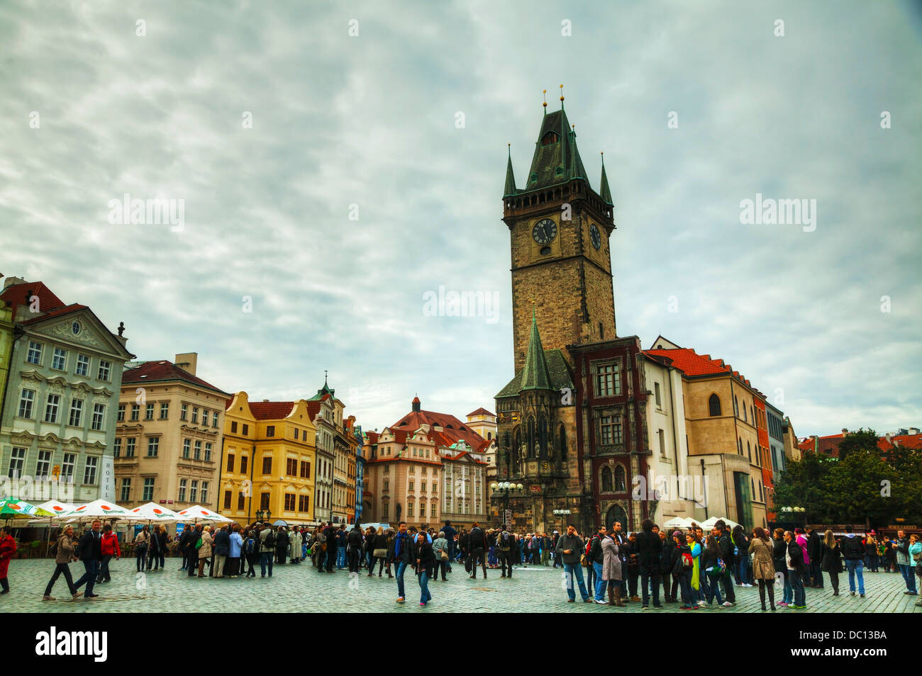 Old Town Square with tourists in Prague. Old Town Square is a historic square in the Old Town. Stock Photo